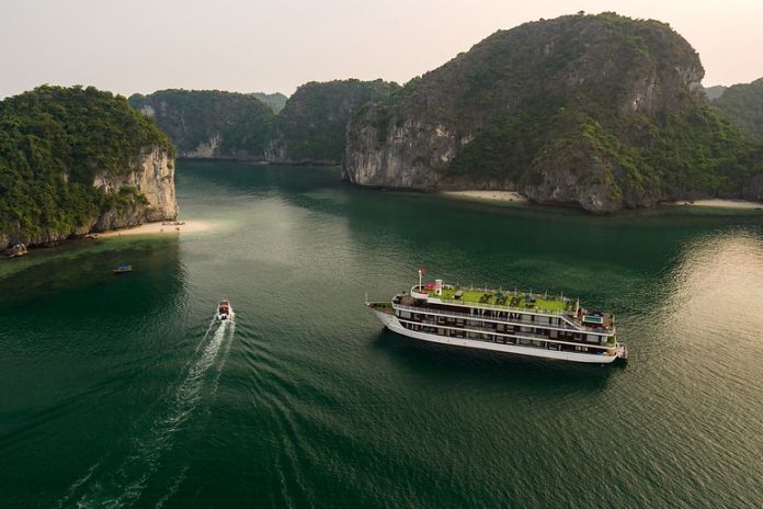 HA LONG BAY- LAN HA BAY (KAYAKING/SWIMMING) –SUNSET PARTY